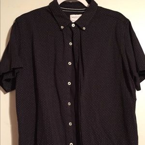 Here's a navy with pin dots button down.